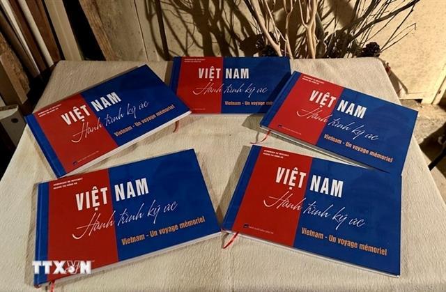 Photo book connects cultures of Việt Nam, France

